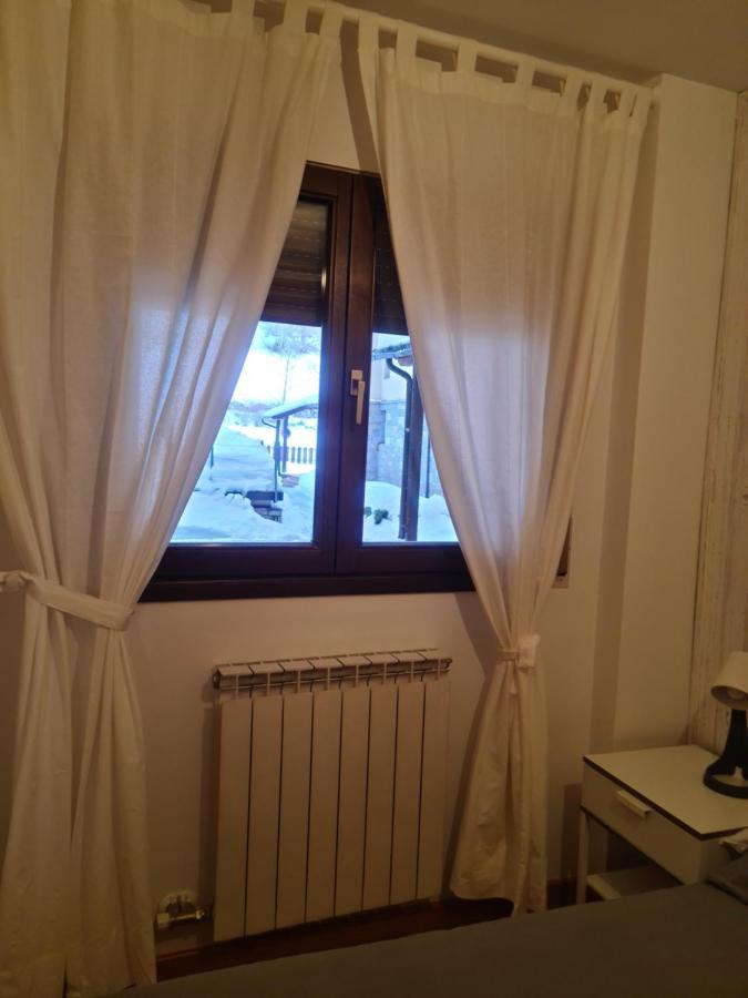 Tuhogarencerler Taquilla Parking En Pistas Apartment ภายนอก รูปภาพ